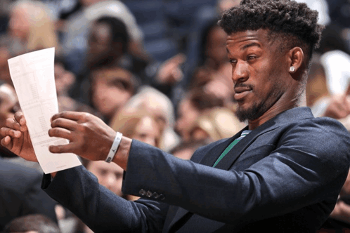 Squinting to read fine print on a phone